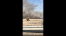 Brush fire breaks out near dam outside Los Angeles