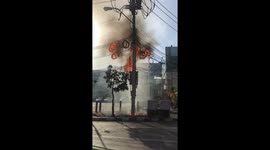 Burning rings of fire seen on Thai street