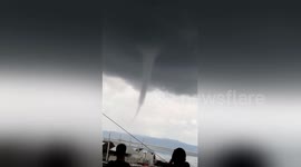 Funnel cloud scares islanders as it heads towards land