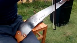 Chinese man uses musical saw to play Japanese ballad