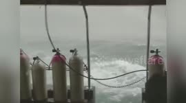 Footage shows tourist boat struggling in violent storm before it capsized off Thailand