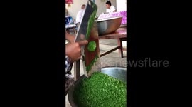 Chinese chef creates quick and safe way to slice chives