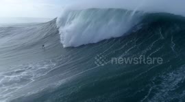 WITH SLATES: Spectacular drone footage captures surfer getting ‘eaten alive’ by monster wave
