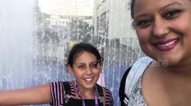 Keeping cool in the water fountains at Southbank Centre London