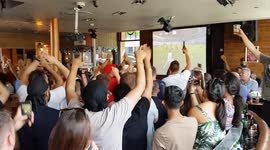 England fans celebrate wildly in unison after goal against Sweden