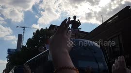 England fans celebrate on top of bus in Birmingham