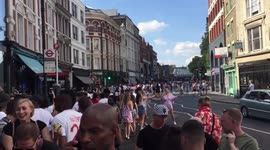 England fans sing Three Lions and stop London bus in Shoreditch after Sweden win