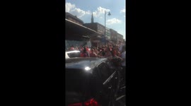 Fans celebrate England victory in Clapham North