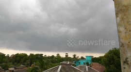 suddenly the entire village was buried under a terrible black cloud
