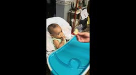 baby eating lemon for the first time
