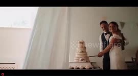 Footage shows wedding couple going wild as England score as they cut cake
