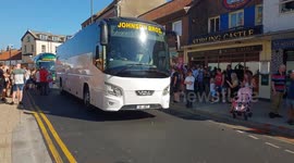Football fans celebrate in the streets of Bridlington after England beat Sweden.