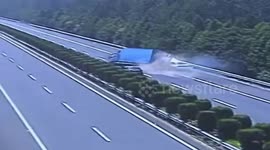 Lorry flips over on motorway after being rear-ended by speeding car