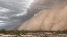 Dust storm moving through the Arizona desert near Gila Bend.