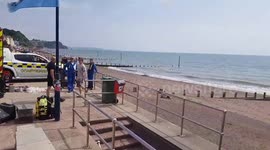Royal navy bomb experts out looking at a Unexploded bomb