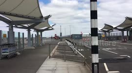 Firefighters tackle car fire at Heathrow Terminal 5