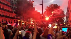 French fans chant on streets of Paris as team heads to World Cup final
