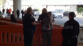 LAX airport police on a  Alleged domestic violence call at lax us customs officer saw it all