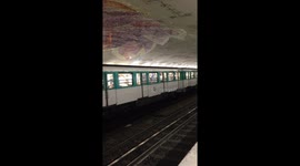 French fans seen jumping and cheering in excitement inside departing train