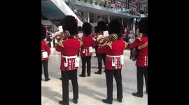 British Army band plays 'Football's Coming Home' at Waterloo Station