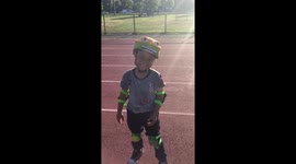 Justin jr riding his bike in the park