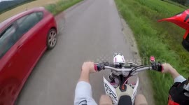 Motorbiker captures heart-stopping moment he ducks under truck