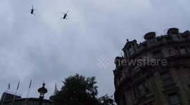 !00 years of the RAF air show across London Helicopters flying in formation over Trafalgar Square and on down Pall Mall to Buckingham Palace by Jim Connor