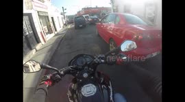 girl caught driving and using the cellphone, then honk on a lady