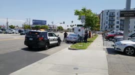 Cop gets a thank you kiss Lax airport police  on a car stop outside of lax