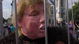 Trump in cage in Parliament Square, London, UK