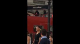 Drake filming music video on red bus in London, Piccadilly Circus.