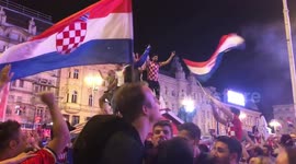 Croatian football fans celebrating entering Finals of Russia 2018 at main square in Zagreb