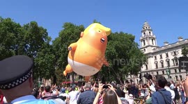 Moment Trump baby blimp is brought back down to Earth in Parliament Square