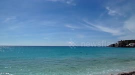 American Airlines passenger jet landing next to Maho beach