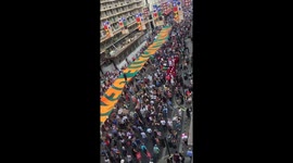 View from building captures protest in London streets against Trump
