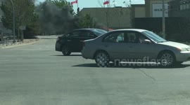 Insane car fire and explosion in parking lot