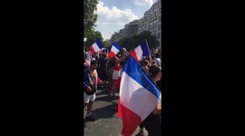 French fans gather on Champs-Élysées for final