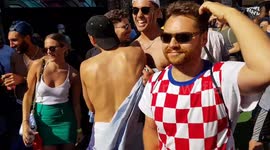 French fans celebrate in London as lone Croatia supporter looks on
