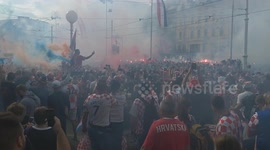 Zagreb submerged in clouds of coloured smoke after France beats Croatia