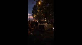 Out-of-control fans in Paris overturn car as World Cup celebrations erupt into chaos
