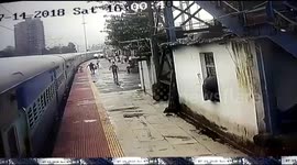 Hero cop risks life to save passenger dangling from train door