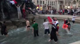 Jubilant fans jump into fountain in Lyon as France wins second World Cup title