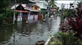 Kids playing in drainage water