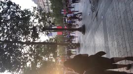 People running in fear at World Cup parade