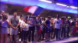 French fans break into chorus of La Marseillaise while waiting for train