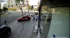 Worker lands on his feet after scaffolding collapse in China