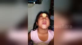 Newsflare Edit - Little girl does 'biscuit challenge' but brother can't help cheating