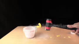 Watch rubber bath toys get destroyed with a hammer after being placed in liquid nitrogen