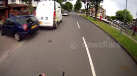 Road Rage Driver Spits at cyclist
