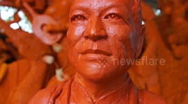 Waxwork tribute to hero diver killed in Thai cave
